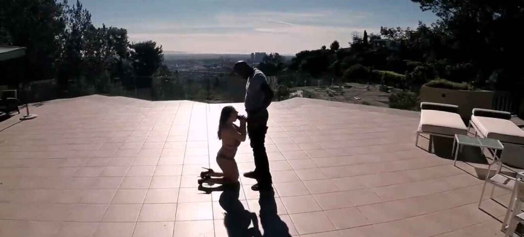 angela white on the deck overlooking la gobbling up that bbc